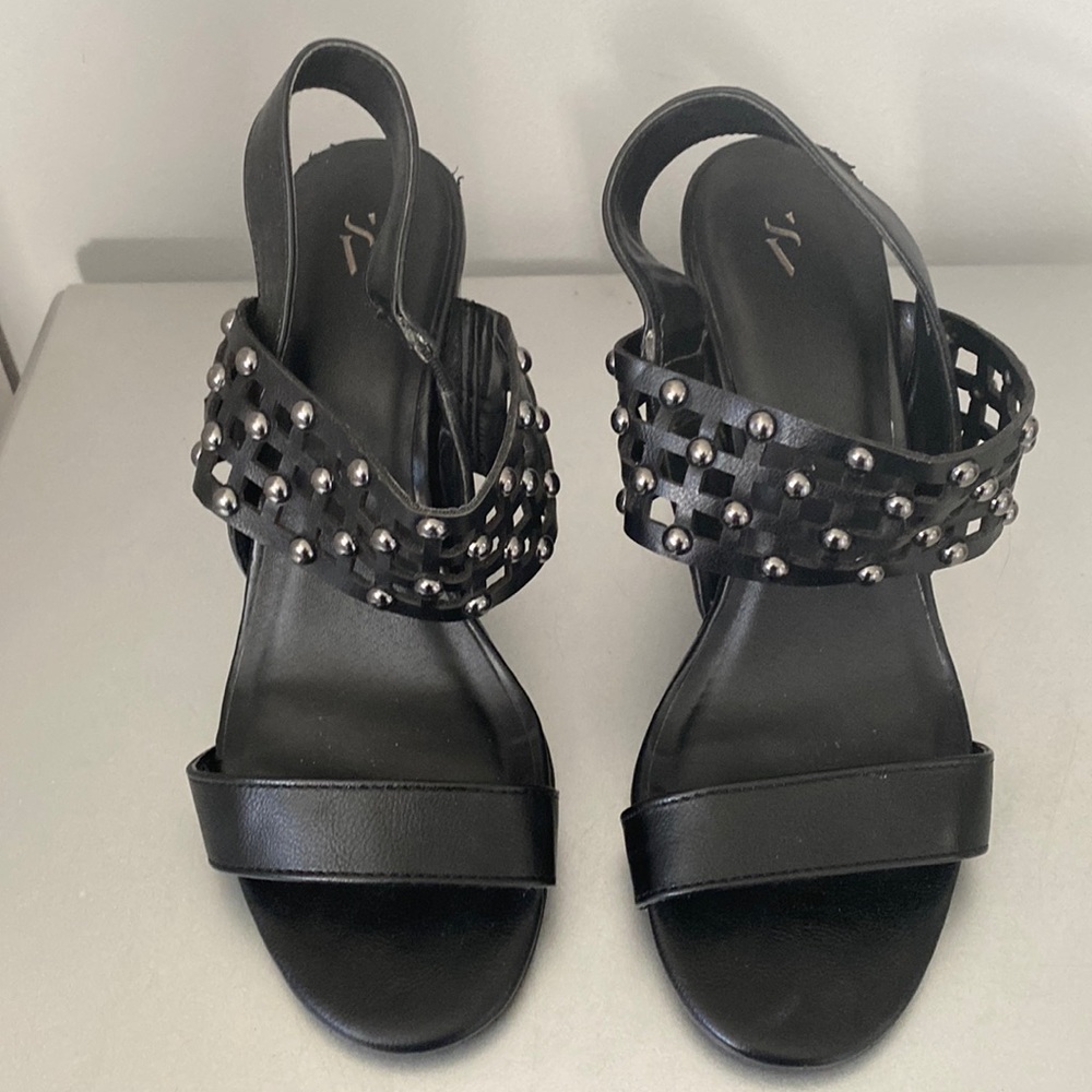 Worn once 4 inch heal platform sandals with studs. Smoke free home